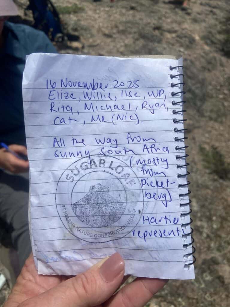 Saint Helena: A Gem in the South Atlantic 3 Ryan and the crew completing the Sugarloaf trail with a stamp and signing.