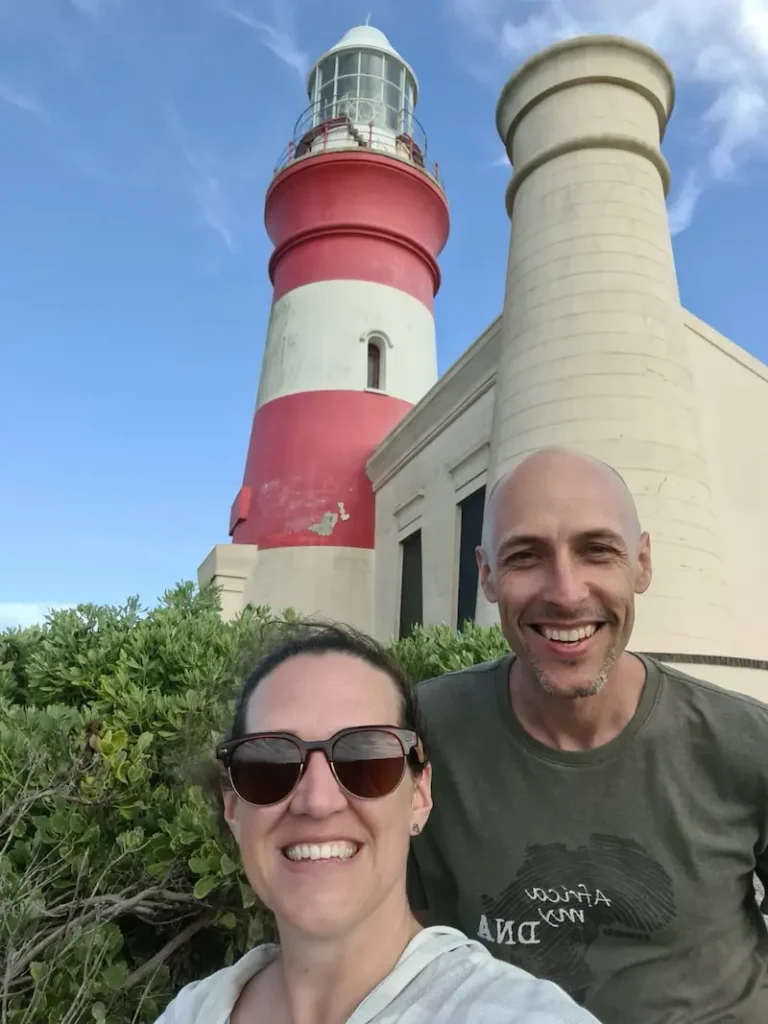 Self-Drive vs. Private Guided: How to Tackle South Africa’s Garden Route 🇿🇦 4 Ryan and Rea at the Cape Agulhas Lighthouse at the Southern Tip of Africa